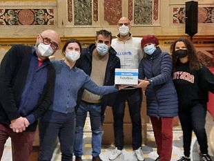 pallium-e-comunita-di-santegidio-insieme-per-il-natale