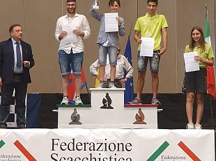 scacchi-orlando-pin-11-anni-campione-italiano