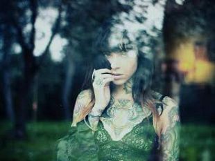 b402141831-il-corpo-tatuato-alla-ricerca-fotografica-di-un-insolita-bellezza