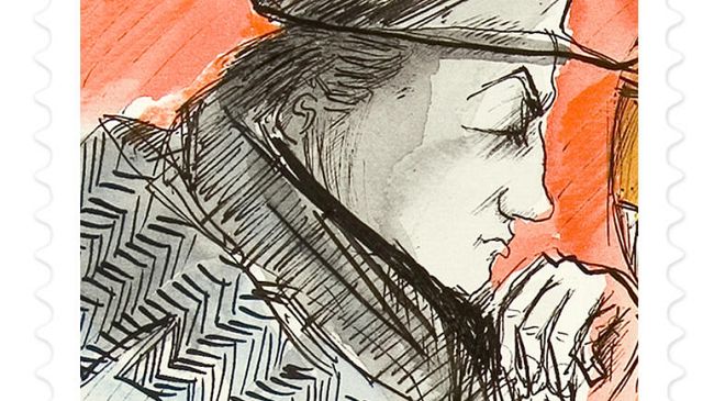 Un francobollo con l'autoritratto di Federico Fellini